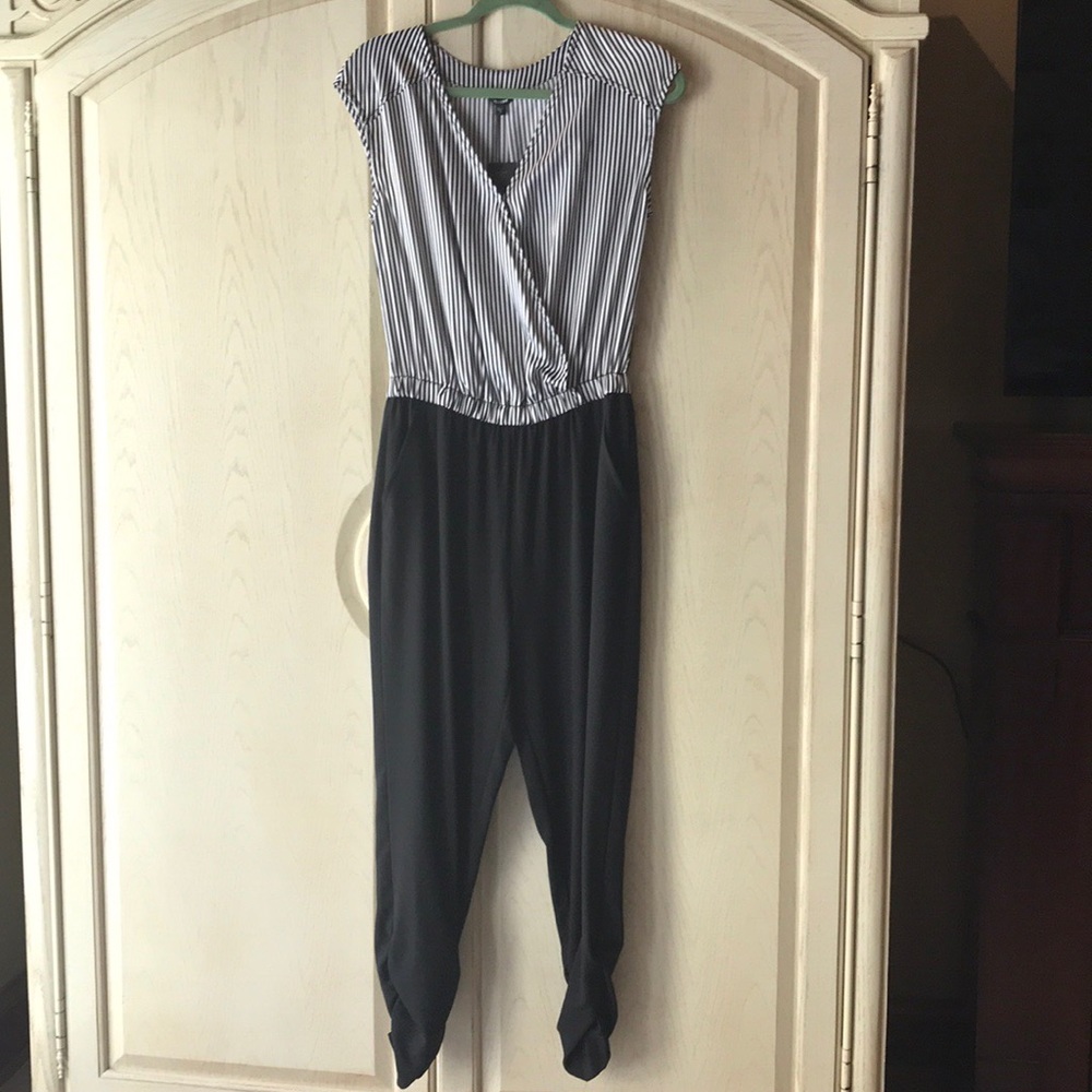 Guess black and white stripped jumpsuit.